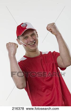 Stock Photo - Portrait of man cheering . Fotosearch