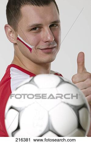 Portrait of man showing thumbs up View Large Photo Image Stock Image - Portrait of man showing thumbs up . Fotosearch