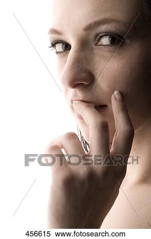 Stock Photography - Portrait of young woman posing . Fotosearch
