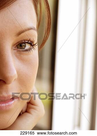 Portrait of young woman smiling View Large Photo Image Stock Photography - Portrait of young woman smiling . Fotosearch