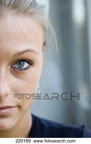 Stock Photo - Portrait of young woman . Fotosearch