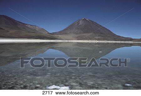Reflection of mountains in lake, Bolivia View Large Photo Image Stock Photo - Reflection of mountains in lake, Bolivia . Fotosearch