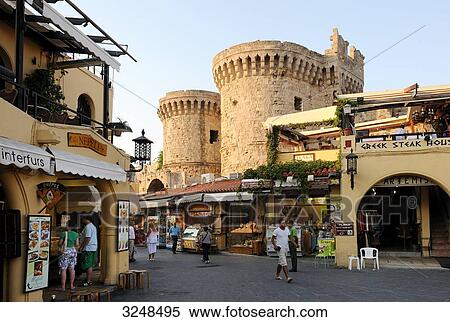Restaurants and shops at the marketsquare of Rhodes, Greece View Large Photo Image Stock Photography - Restaurants and shops at the marketsquare of Rhodes, Greece . Fotosearch