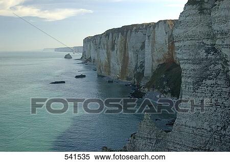 Rock formations at seaside, Etretat, Seine-Maritime, Haute-Normandy, France View Large Photo Image Stock Photography - Rock formations at seaside, Etretat, Seine-Maritime, Haute-Normandy, France . Fotosearch