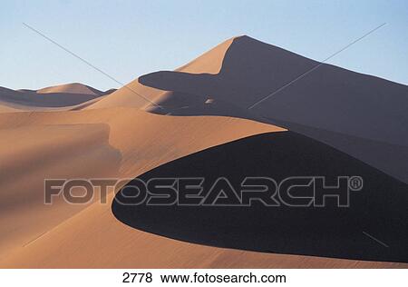 Sand dunes in desert, Namib-Naukluft National Park, Namib Desert, Namibia View Large Photo Image Stock Photo - Sand dunes in desert, Namib-Naukluft National Park, Namib Desert, Namibia . Fotosearch