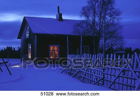 Snow covered house at dusk View Large Photo Image Stock Photo - Snow covered house at dusk . Fotosearch