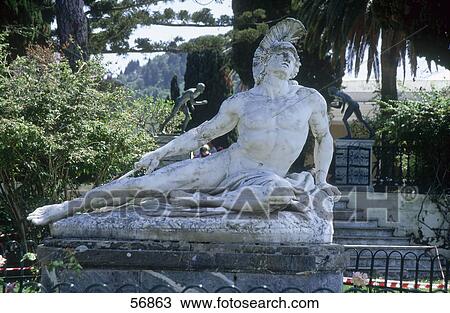 Stock Image - Statue of injured Achilles on pedestal, Corfu Island, Greece . Fotosearch
