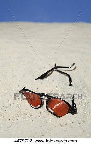Sunglasses at beach View Large Photo Image Stock Image - Sunglasses at beach . Fotosearch