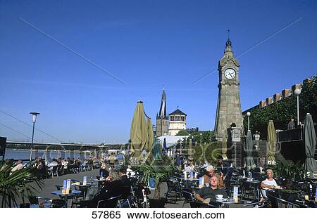 Tourists at sidewalk cafe, Duesseldorf, North Rhine-Westphalia, Germany View Large Photo Image Stock Photography - Tourists at sidewalk cafe, Duesseldorf, North Rhine-Westphalia, Germany . Fotosearch