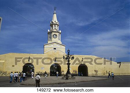 Tourists in front of clock tower, Puerta Del Reloj, Colombia View Large Photo Image Stock Image - Tourists in front of clock tower, Puerta Del Reloj, Colombia . Fotosearch