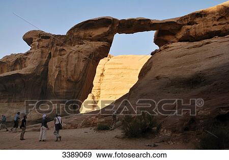 Tourists in Wadi Rum, Jordan, Asia View Large Photo Image Stock Photo - Tourists in Wadi Rum, Jordan, Asia . Fotosearch