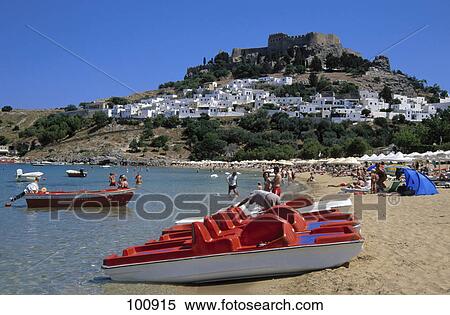 Tourists on beach, Lindos, Dodecanese, Aegean Islands, Greece View Large Photo Image Stock Photography - Tourists on beach, Lindos, Dodecanese, Aegean Islands, Greece . Fotosearch