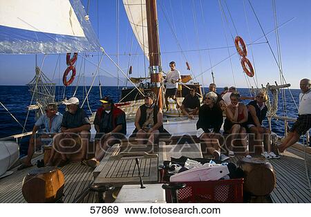 Stock Photo - Tourists on sailing ship in sea, Turkey . Fotosearch