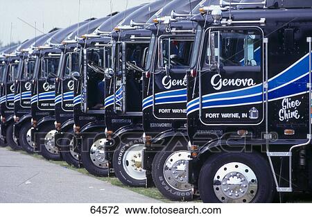Stock Image - Trucks parked at parking area . Fotosearch