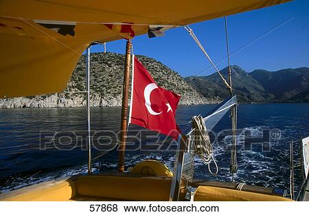 Turkey flag on the rear of a boat View Large Photo Image Stock Photo - Turkey flag on the rear of a boat . Fotosearch