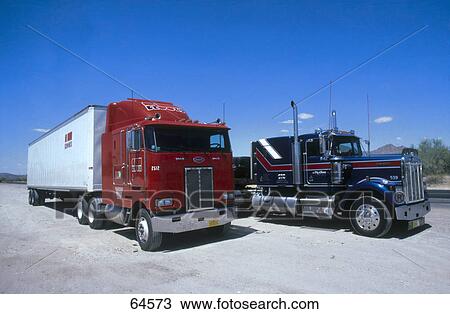 Two trucks parked at roadside, USA View Large Photo Image Stock Image - Two trucks parked at roadside, USA . Fotosearch