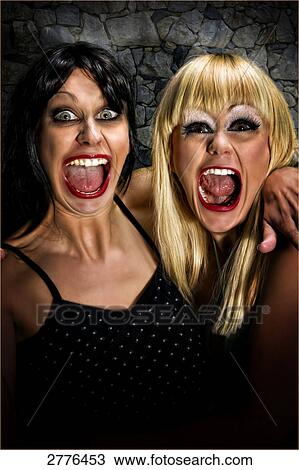 two women with a wide open mouth, portrait View Large Photo Image Stock Image - two women with a wide open mouth, portrait . Fotosearch