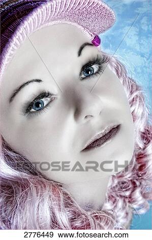 Stock Photo - woman with a cap, portrait . Fotosearch