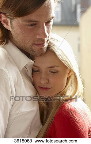 Stock Photo - Young couple close together . Fotosearch