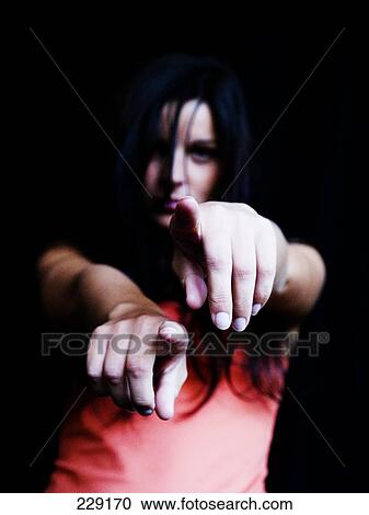 Stock Image - Young woman dancing . Fotosearch