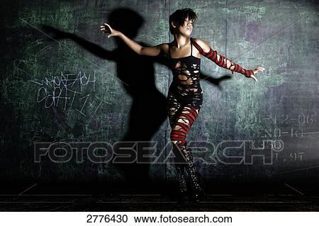 Stock Image - Young woman posing . Fotosearch