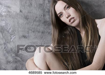 Stock Photography - Young woman with long brown hair . Fotosearch