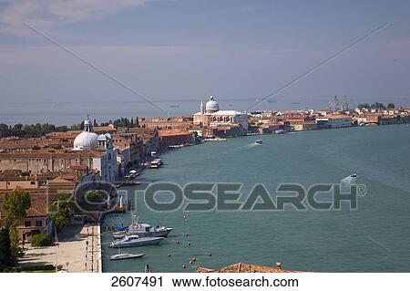 Stock Image - Aerial view of boats in canal, Veneto, Venice, Italy . Fotosearch
