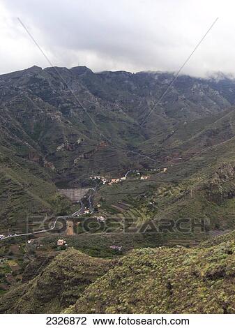 Aerial view of buildings in valley, La Gomera, Canary Islands, Spain View Large Photo Image Stock Image - Aerial view of buildings in valley, La Gomera, Canary Islands, Spain . Fotosearch