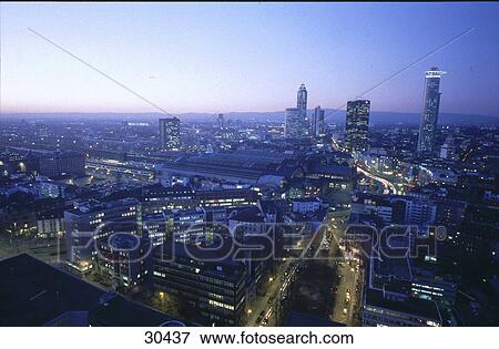 Aerial view of city at dusk, Frankfurt, Germany View Large Photo Image Stock Photo - Aerial view of city at dusk, Frankfurt, Germany . Fotosearch
