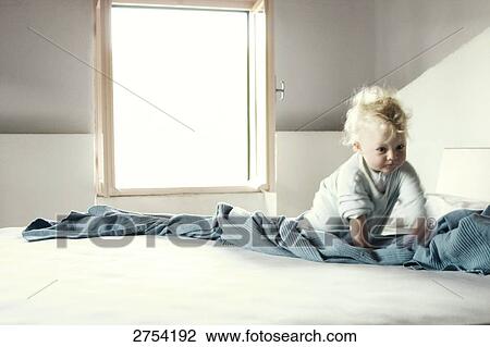Baby crawling on bed View Large Photo Image Stock Image - Baby crawling on bed . Fotosearch
