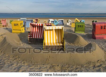 Stock Image - Beach chairs on the beach, Langeoog, Germany . Fotosearch