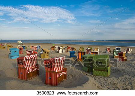 Beach chairs on the beach, Langeoog, Germany View Large Photo Image Stock Image - Beach chairs on the beach, Langeoog, Germany . Fotosearch