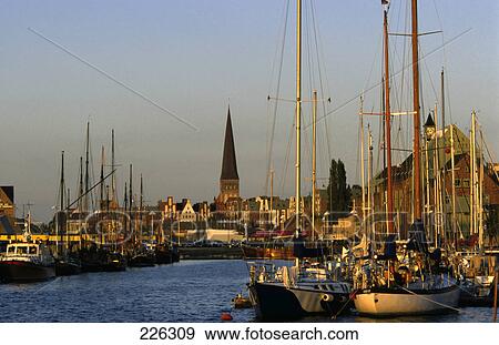 Boats docked at harbor, Germany View Large Photo Image Stock Photo - Boats docked at harbor, Germany . Fotosearch