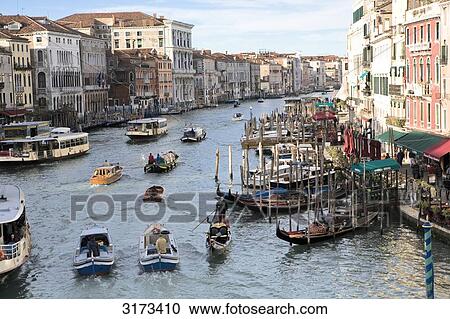 Boats on canal in Venice, Italy, elevated view View Large Photo Image Stock Image - Boats on canal in Venice, Italy, elevated view . Fotosearch