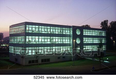 Stock Photography - Building lit up at dawn . Fotosearch