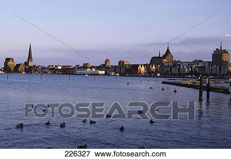 Stock Photo - Buildings at waterfront, Rostock, Mecklenburg-Western Pomerania, Germany . Fotosearch