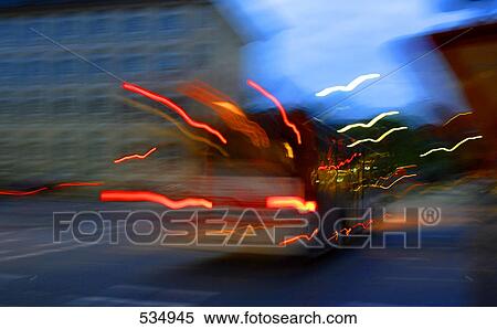 Bus in motion in street View Large Photo Image Stock Photography - Bus in motion in street . Fotosearch
