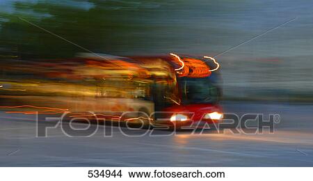 Bus in motion on road View Large Photo Image Picture - Bus in motion on road . Fotosearch