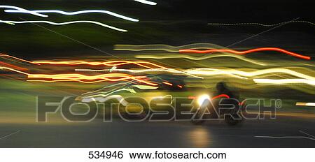 Bus in motion on street View Large Photo Image Stock Photograph - Bus in motion on street . Fotosearch