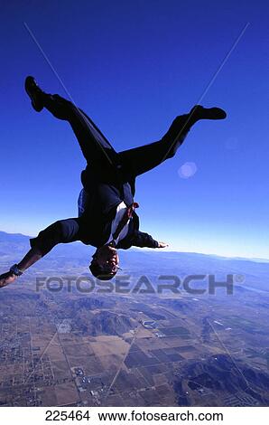 Businessman skydiving View Large Photo Image Picture - Businessman skydiving . Fotosearch
