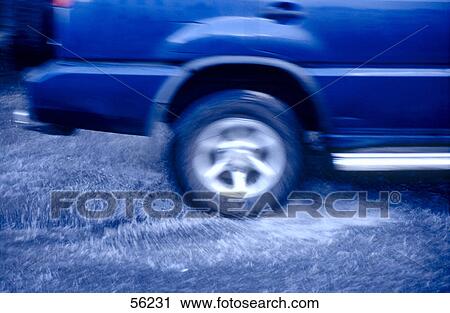 Car on flooded road View Large Photo Image Stock Image - Car on flooded road . Fotosearch