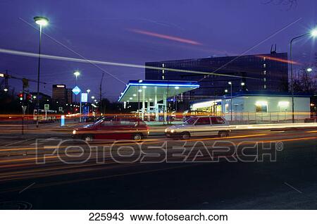 Cars in motion on city road at night, Wiesbaden, Germany View Large Photo Image Stock Image - Cars in motion on city road at night, Wiesbaden, Germany . Fotosearch