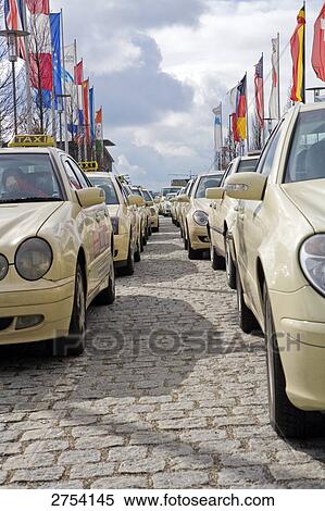Cars in row View Large Photo Image Stock Photography - Cars in row . Fotosearch