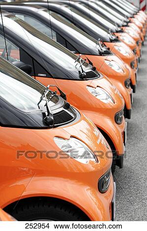 Cars parked in row View Large Photo Image Picture - Cars parked in row . Fotosearch