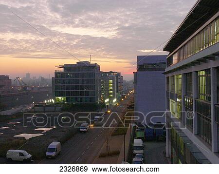 Cars parked in street at dusk, Frankfurt, Germany View Large Photo Image Stock Photo - Cars parked in street at dusk, Frankfurt, Germany . Fotosearch
