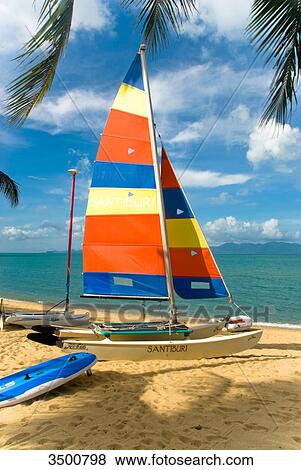 Stock Photo - Catamaran on Mae Nam Beach, Ko Samui, Thailand . Fotosearch