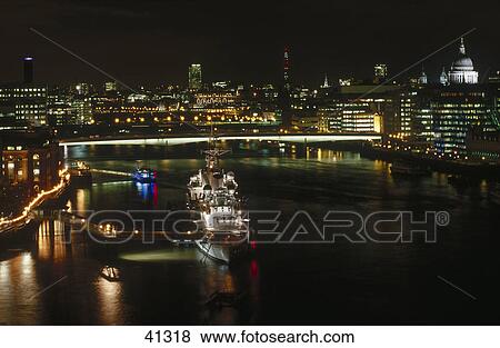 City lit up at night, Thames River, London, England View Large Photo Image Stock Photo - City lit up at night, Thames River, London, England . Fotosearch
