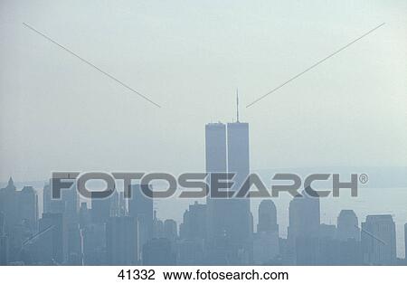 Stock Image - City skyline in fog, World Trade Center, Manhattan, New York City, New York State, USA . Fotosearch