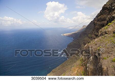 Cliff line of Gran Canaria, Canary Islands, Spain, high angle view View Large Photo Image Picture - Cliff line of Gran Canaria, Canary Islands, Spain, high angle view . Fotosearch