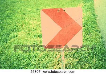 Close-up of arrow sign View Large Photo Image Stock Photo - Close-up of arrow sign . Fotosearch